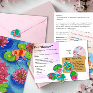 Flat lay of Heart Swapz Monthly Mail Club August kit with art print, journaling cards, prompt sheet, and pink envelope.