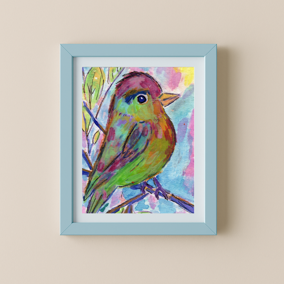 Green bird art print in a baby blue 5x7 frame displayed on a wall – colorful watercolor bird illustration