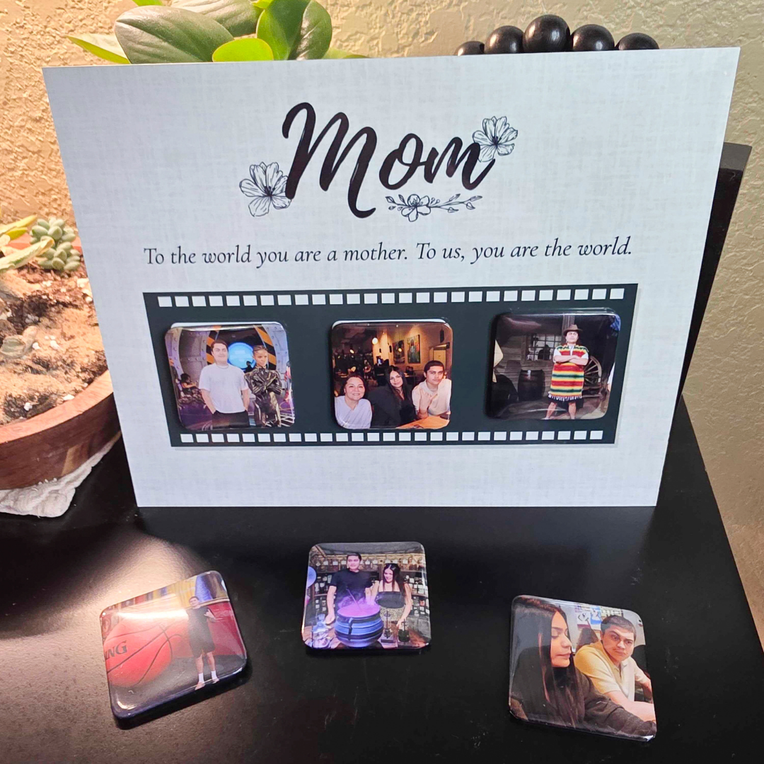 8x10 swappable photo frame for Mom showing three 2×2 magnetic photos on the front, with three extra magnets on the table for quick swaps