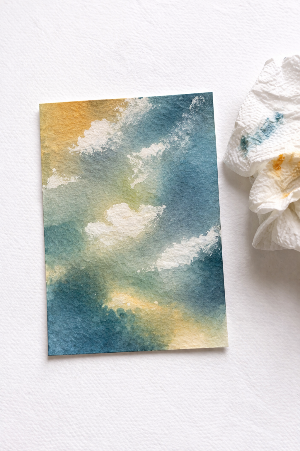 Lifting and blotting watercolor technique on an ATC card